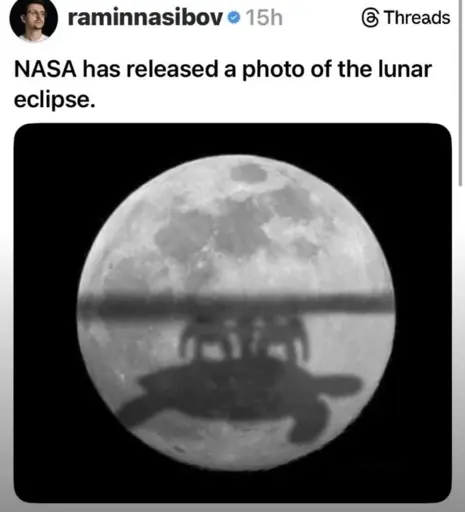 Microblog post: "NASA has released a photo of the lunar eclipse." Picture of the moon with the shadow of a group of elephants riding a giant turtle, carrying a flat planet, in reference to discworld